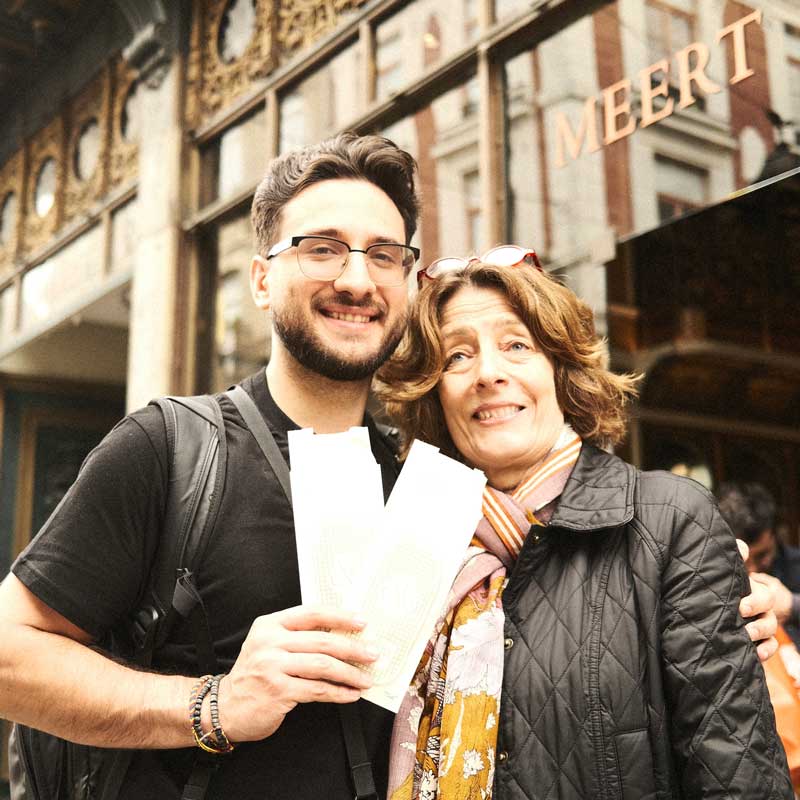 French immersion students in Lille enjoying a traditional Méert waffle during their city break from London