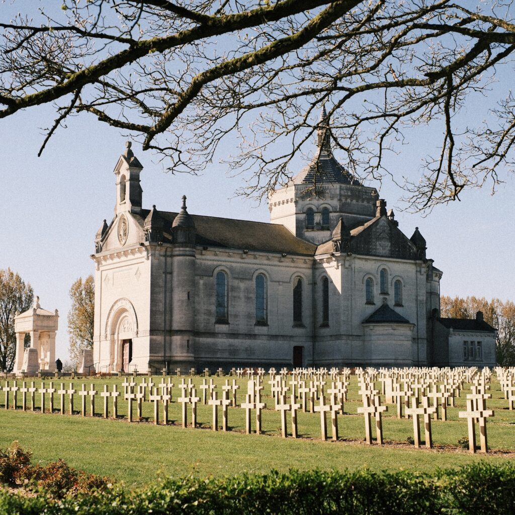 Student and teacher visiting a World War I memorial site in northern France during a cultural immersion program